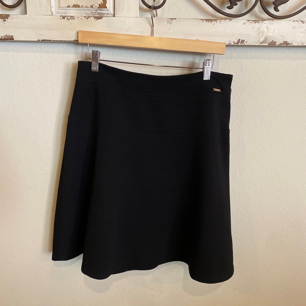 Stylish Ivanka Trump black skirt